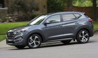 2016-Hyundai-Tucson-Profile-Driving.jpg